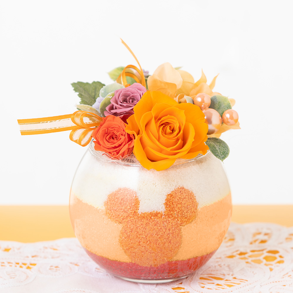 ディズニー/プリザーブドフラワー/花ギフト・プレゼント｜イイハナ・ドットコム（花ギフトの専門店）｜EXディズニー/プリザーブドフラワー「スイート・マジック〜サンシャイン〜」｜出荷実績300万件以上、13時までのご注文は最短翌日お届け(一部商品は除きます）。インターネットで24時間受付中。千趣会（ベルメゾン）のお花屋さん e87.com