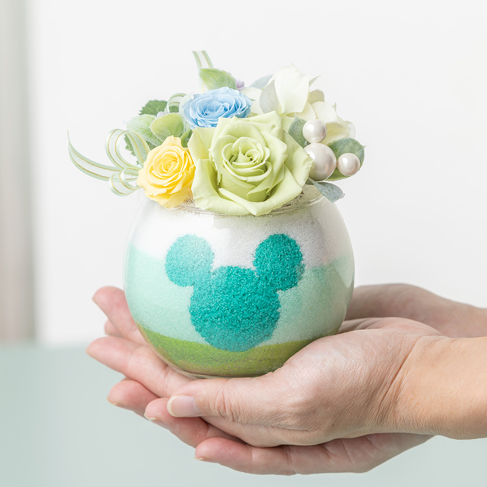 ディズニー/プリザーブドフラワー/花ギフト・プレゼント｜イイハナ・ドットコム（花ギフトの専門店）｜ディズニー/プリザーブドフラワー「スイート・マジック〜フレッシュミント〜」｜出荷実績300万件以上、13時までのご注文は最短翌日お届け(一部商品は除きます）。インターネットで24時間受付中。千趣会（ベルメゾン）のお花屋さん e87.com